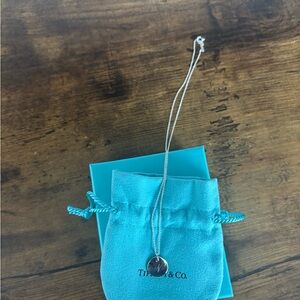 Tiffany & Co. Silver Pendant Necklace with Blue Pouch